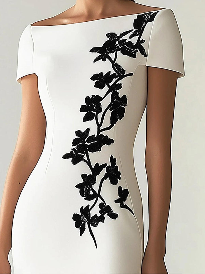 Heike | Chic midi dress with a floral print and a boat neckline