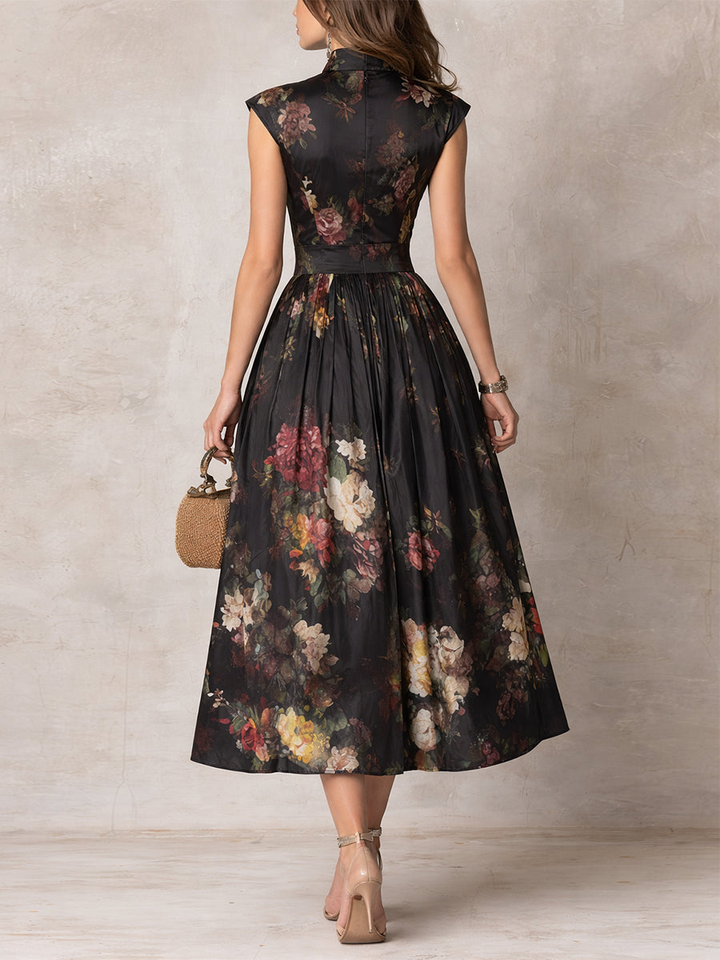 Charlotte | Pleated satin midi dress with black floral pattern